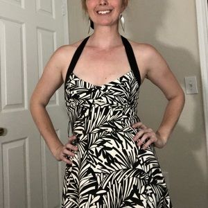 Classy black and white halter dress.